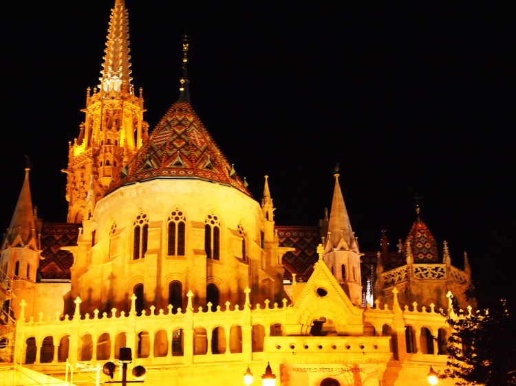 Part of the Fisherman’s Bastion with Matthias Church in the background. The Fisherman's Bastion was built at the turn of the century to commemorate the 1000th birthday of Hungary. It's seven towers represent the seven tribes that came together to found the country. 