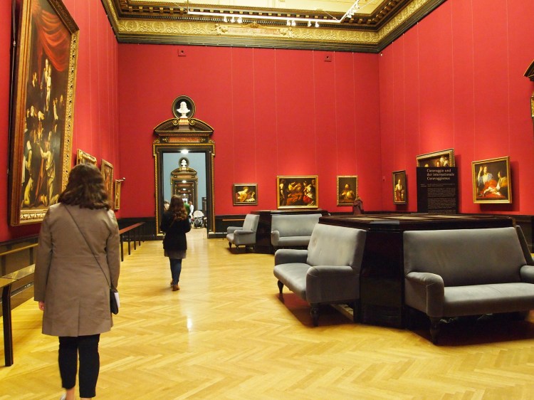 A room filled with paintings by famed artist Caravaggio and his contemporaries. 